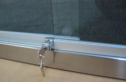 Enclosed bulletin board lock and key on sliding door track></div>
        <div> </div>A
 <br />
          
          <p class=