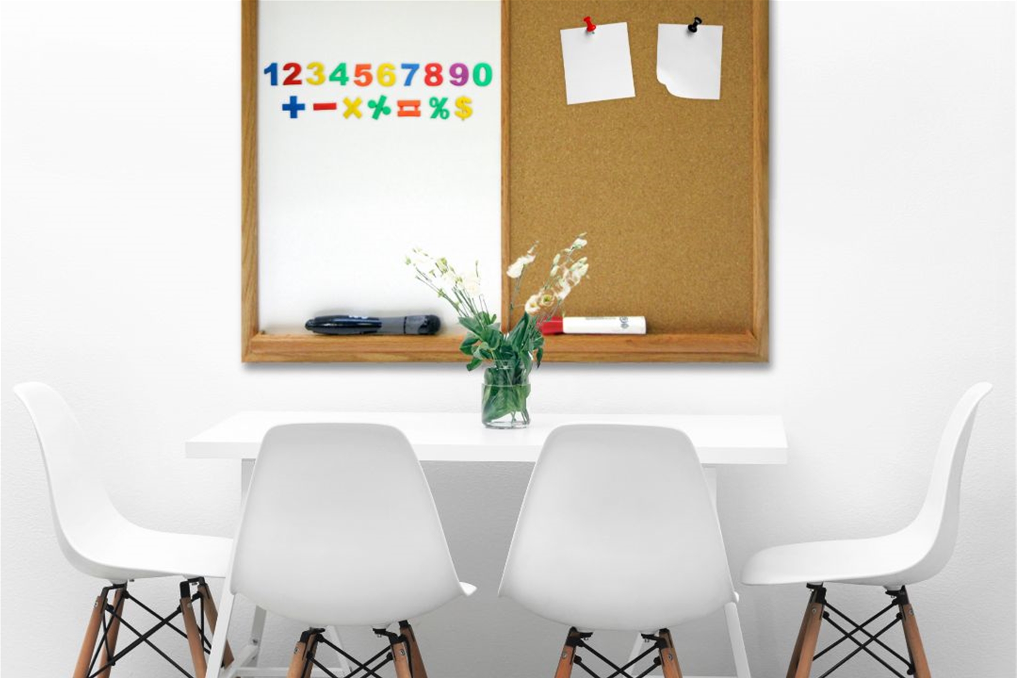 This stylish combination board features a magnetic whiteboard