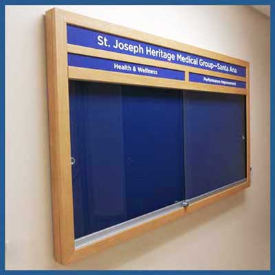 Create custom enclosed cord bulletin board to your exact size - swing door or sliding door - 12 x 12 inches to 4 feet x 8 feet.