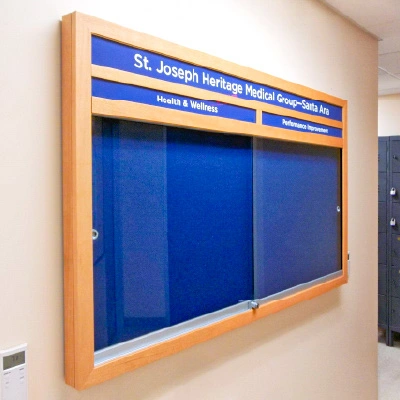 Create a custom enclosed cork bulletin board to your exact size - swing door or sliding door - 12 x 12 inches to 4 feet x 8 feet.